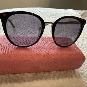 LOVE MOSCHINO 
New with a box